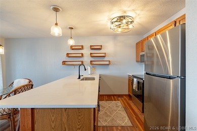 Experience lake life at its finest in this stunning two-level, 1 - photo 9