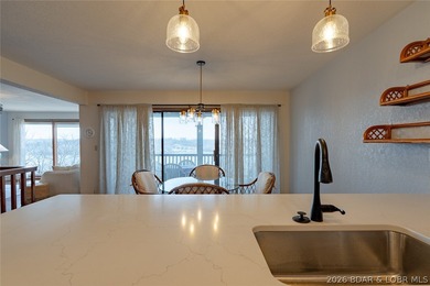 Experience lake life at its finest in this stunning two-level, 1 - photo 10