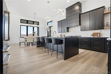 This striking new-construction estate commands panoramic main - photo 10