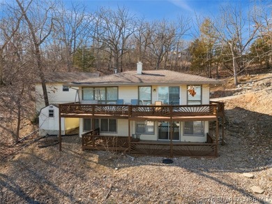 Updated Lake Front Home with Cove protection and Main Channel - photo 1