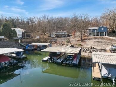 Updated Lake Front Home with Cove protection and Main Channel - photo 2