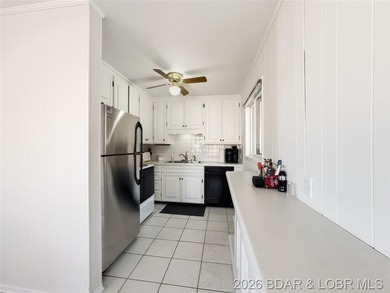 Updated Lake Front Home with Cove protection and Main Channel - photo 8