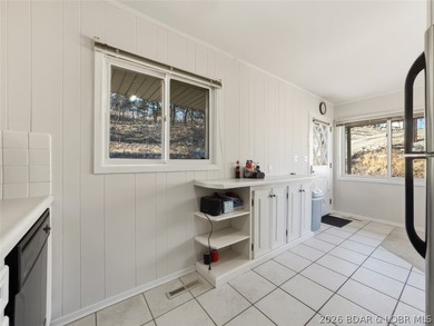 Updated Lake Front Home with Cove protection and Main Channel - photo 10