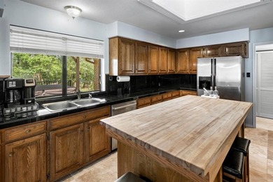 Welcome to your retreat in Holly Lake Ranch, a premier gated