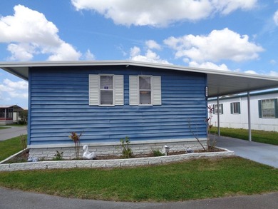 COME TAKE A PIECE OF PARADISE... THIS HOME IS LOCATED IN A 55 - photo 3