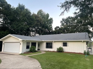 Lake Home For Sale in Carriere, Mississippi