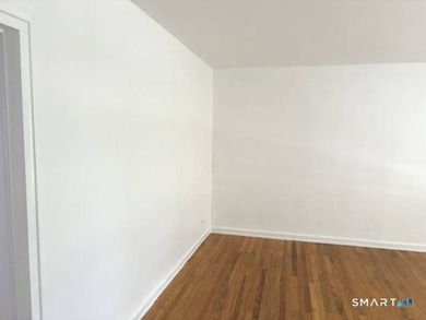 This large one bedroom unit is conveniently located in the - photo 4