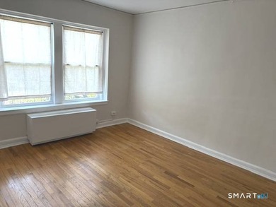 This large one bedroom unit is conveniently located in the - photo 6