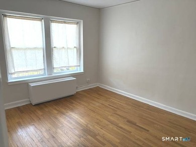 This large one bedroom unit is conveniently located in the - photo 7