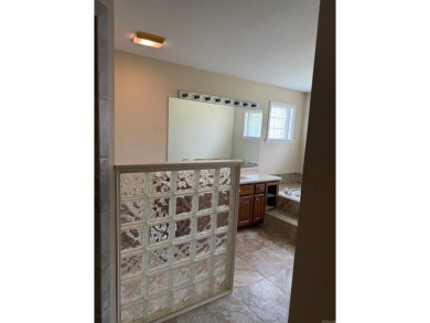 This wonderful 3 bedroom & 2 full bath home awaits is back on