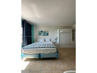 Oceanfront building close to shops and public transportation