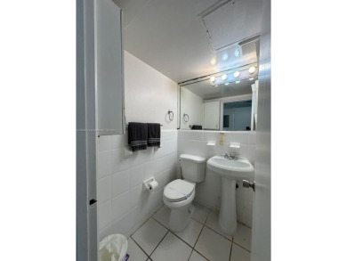 Oceanfront building close to shops and public transportation