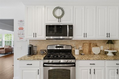 PRICE IMPROVEMENT* Discover an open and inviting floor plan in - photo 9