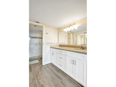 Welcome to this beautifully updated top-floor corner unit in the - photo 22