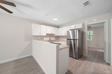 This recently renovated 12-unit apartment building is located - photo 8