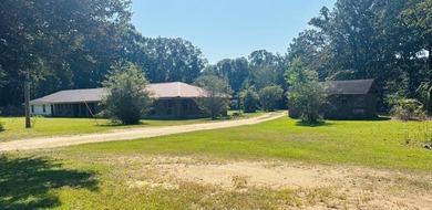 This 5 bedroom, 2 1/2 bath home on 1 acre of land with an - photo 2