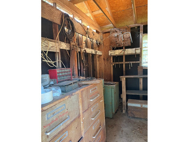 This 5 bedroom, 2 1/2 bath home on 1 acre of land with an - photo 10