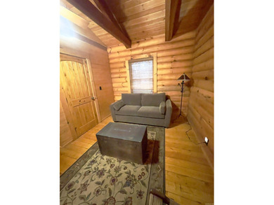 A true Abe Lincoln log home featuring 2 bedrooms, one up, one - photo 16
