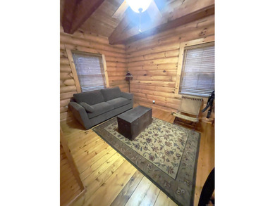 A true Abe Lincoln log home featuring 2 bedrooms, one up, one - photo 17