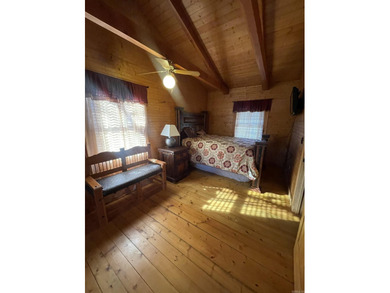 A true Abe Lincoln log home featuring 2 bedrooms, one up, one - photo 18