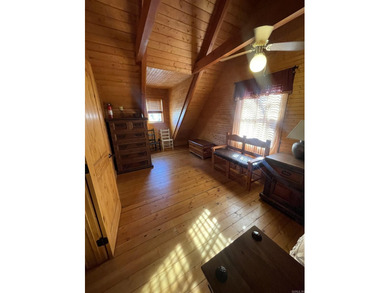 A true Abe Lincoln log home featuring 2 bedrooms, one up, one - photo 19