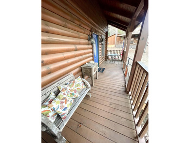 A true Abe Lincoln log home featuring 2 bedrooms, one up, one - photo 22