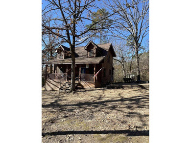 A true Abe Lincoln log home featuring 2 bedrooms, one up, one - photo 28