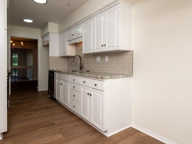 Enjoy refined, low-maintenance living in this fully renovated - photo 12