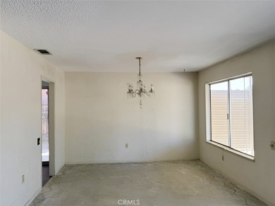 This 2-bedroom, 2-bathroom property offers genuine potential in - photo 12