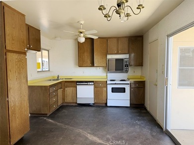 This 2-bedroom, 2-bathroom property offers genuine potential in - photo 13