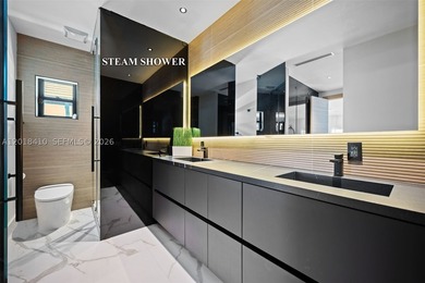 Step into this meticulously renovated residence in the Western - photo 16