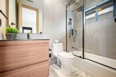 Step into this meticulously renovated residence in the Western - photo 28