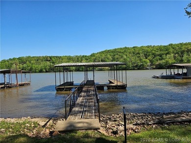 This lakefront homes has many pluses: one level living, attached - photo 4
