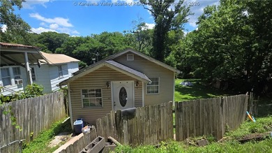 Enjoy beautiful river views from this updated 2 bedroom/1 bath - photo 1