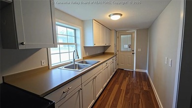 Enjoy beautiful river views from this updated 2 bedroom/1 bath - photo 2