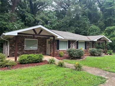 Rare duplex opportunity in Cherokee County! This recently - photo 1