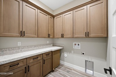 NEW CONSTRUCTION DOUBLE RV GARAGE HOME IN GATED COMMUNITY - photo 13