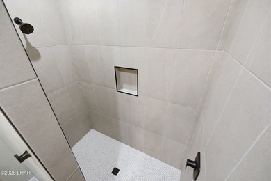 NEW CONSTRUCTION DOUBLE RV GARAGE HOME IN GATED COMMUNITY - photo 16