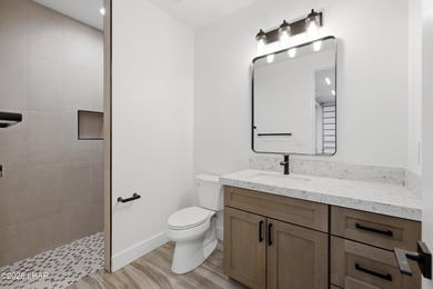 NEW CONSTRUCTION DOUBLE RV GARAGE HOME IN GATED COMMUNITY - photo 30