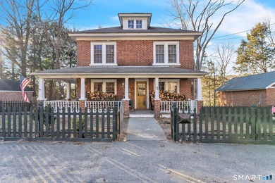 Stately brick Colonial beautifully situated on scenic Mill Pond - photo 1