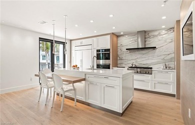 Experience elevated coastal living at Naples Bay Resort, where - photo 12