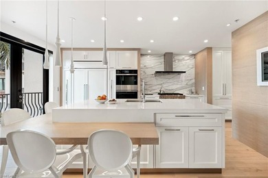 Experience elevated coastal living at Naples Bay Resort, where - photo 13