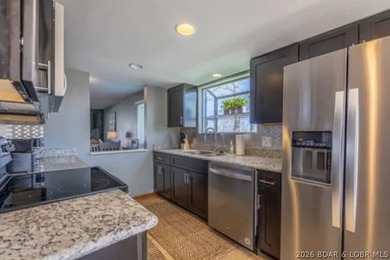 This ground-floor, 1-story, end unit offers plenty of room for - photo 9