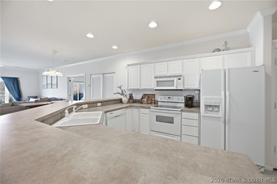 Experience true lakefront living at 440 Cedar Heights, Unit 1B