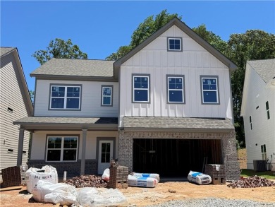 Lake Home For Sale in Flowery Branch, Georgia