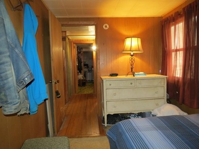 Nestled in the woods this Two bedroom, 1 bath home has a - photo 11
