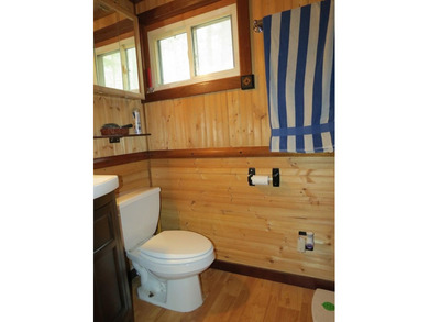 Nestled in the woods this Two bedroom, 1 bath home has a - photo 13