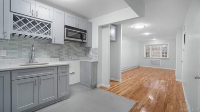 Fully renovated 2-family, 2007 brick-built house. Features 3 bed - photo 13