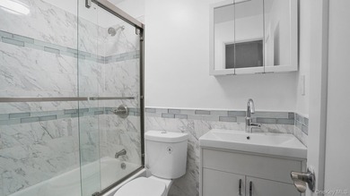 Fully renovated 2-family, 2007 brick-built house. Features 3 bed - photo 15