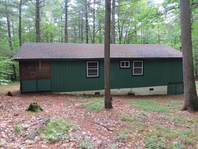 Nestled in the woods this Two bedroom, 1 bath home has a - photo 17